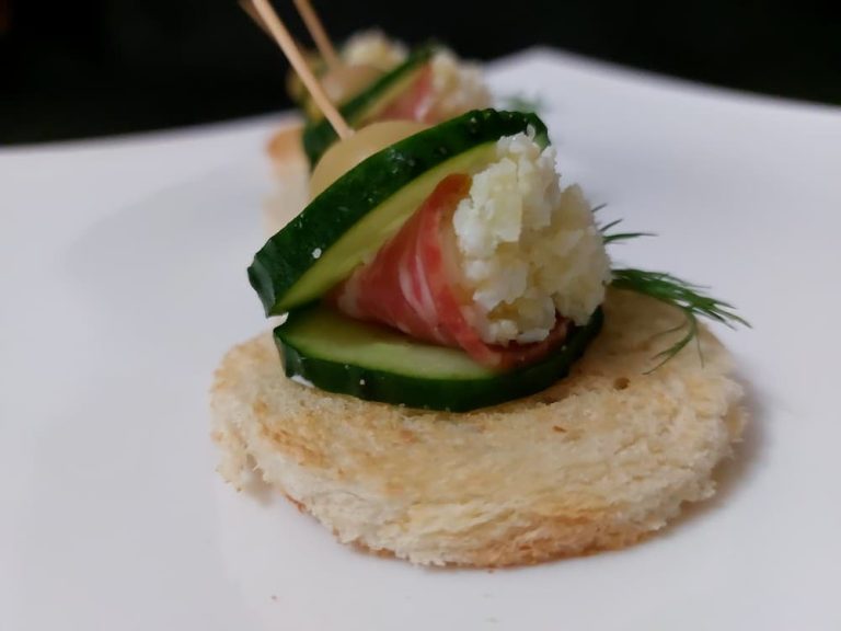 Canape with salami and cream cheese