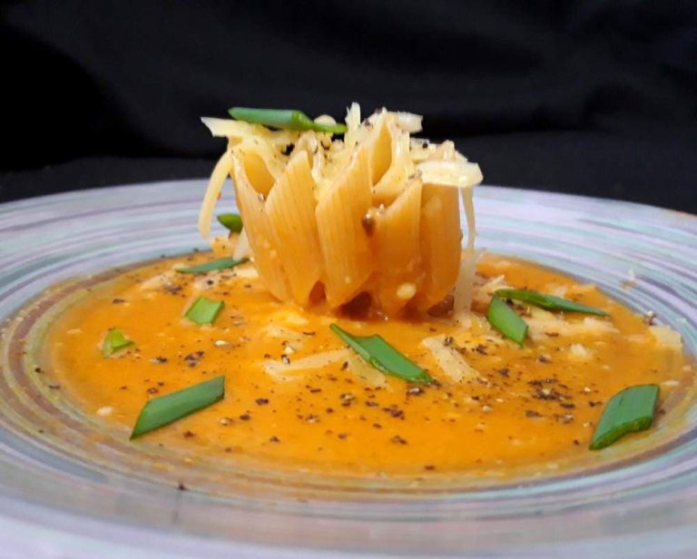 Marinara pasta in a bowl in the microwave