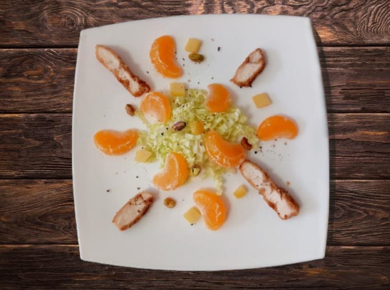 Chicken salad with tangerines and nuts