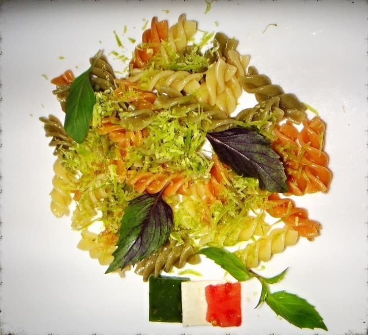 Pasta with green cheese and basil